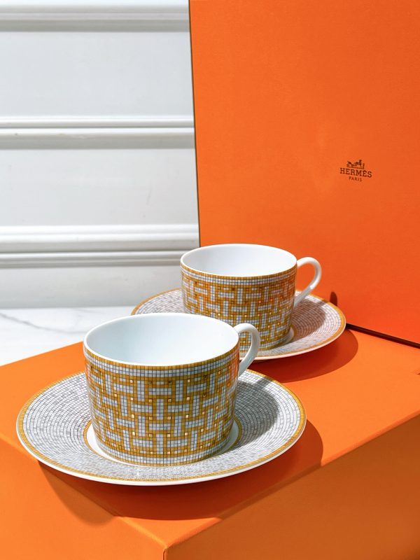 HERMES MOSAIQUE AU 24 TEA CUP AND SAUCER, GOLD64321835929603113