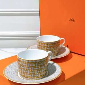 HERMES MOSAIQUE AU 24 TEA CUP AND SAUCER, GOLD64321835929603112