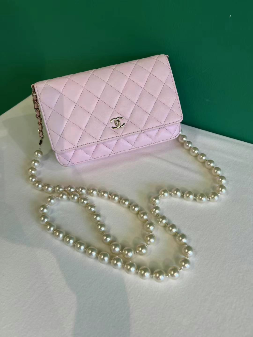 Chanel Pink Pearl Chain WOC – Excellent Condition | Chip Authenticated15 Chanel Pink Pearl Chain WOC – Excellent Condition | Chip Authenticated632279808350741115